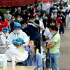 В Китае выявили рекордное за пандемию число заражений COVID-19